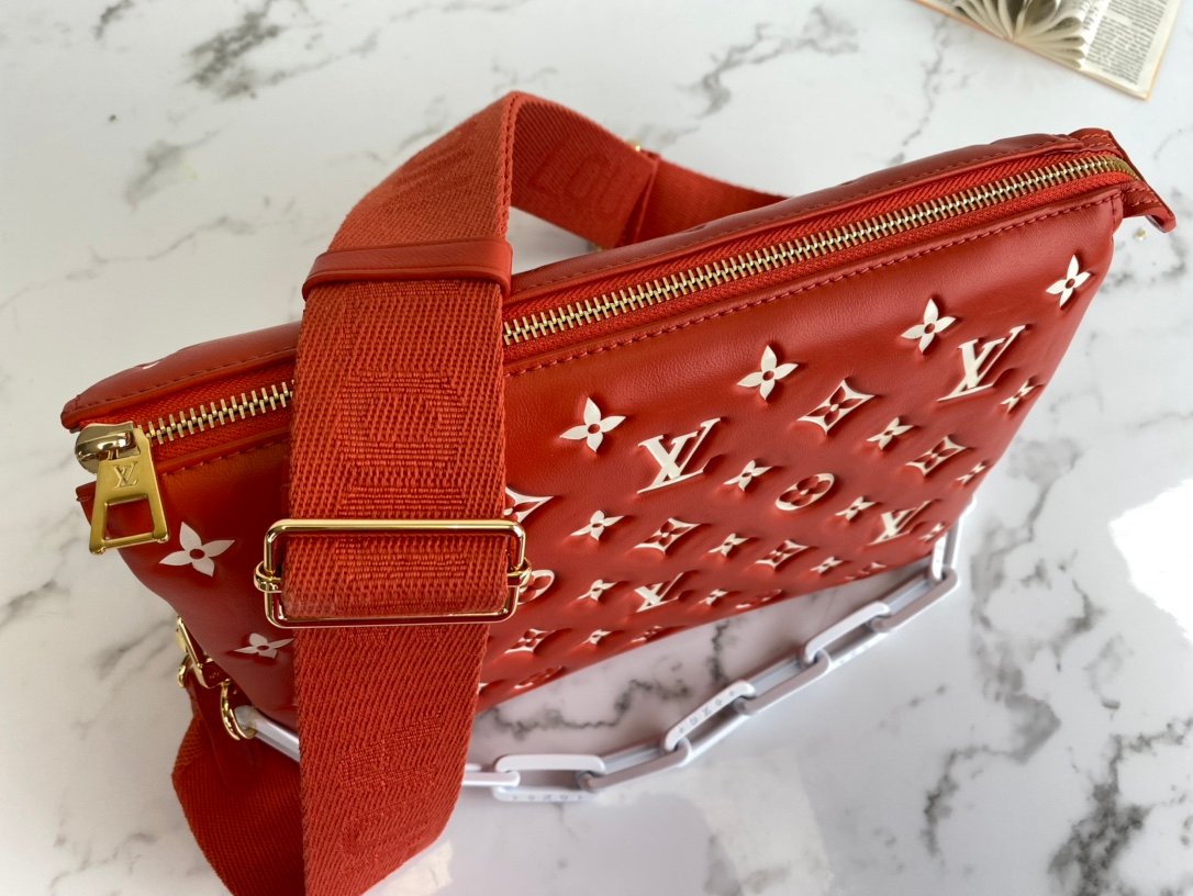 Louis Vuitton COUSSIN PM Handbag Monogram-embossed puffy lambskin Terracotta Brown M20761