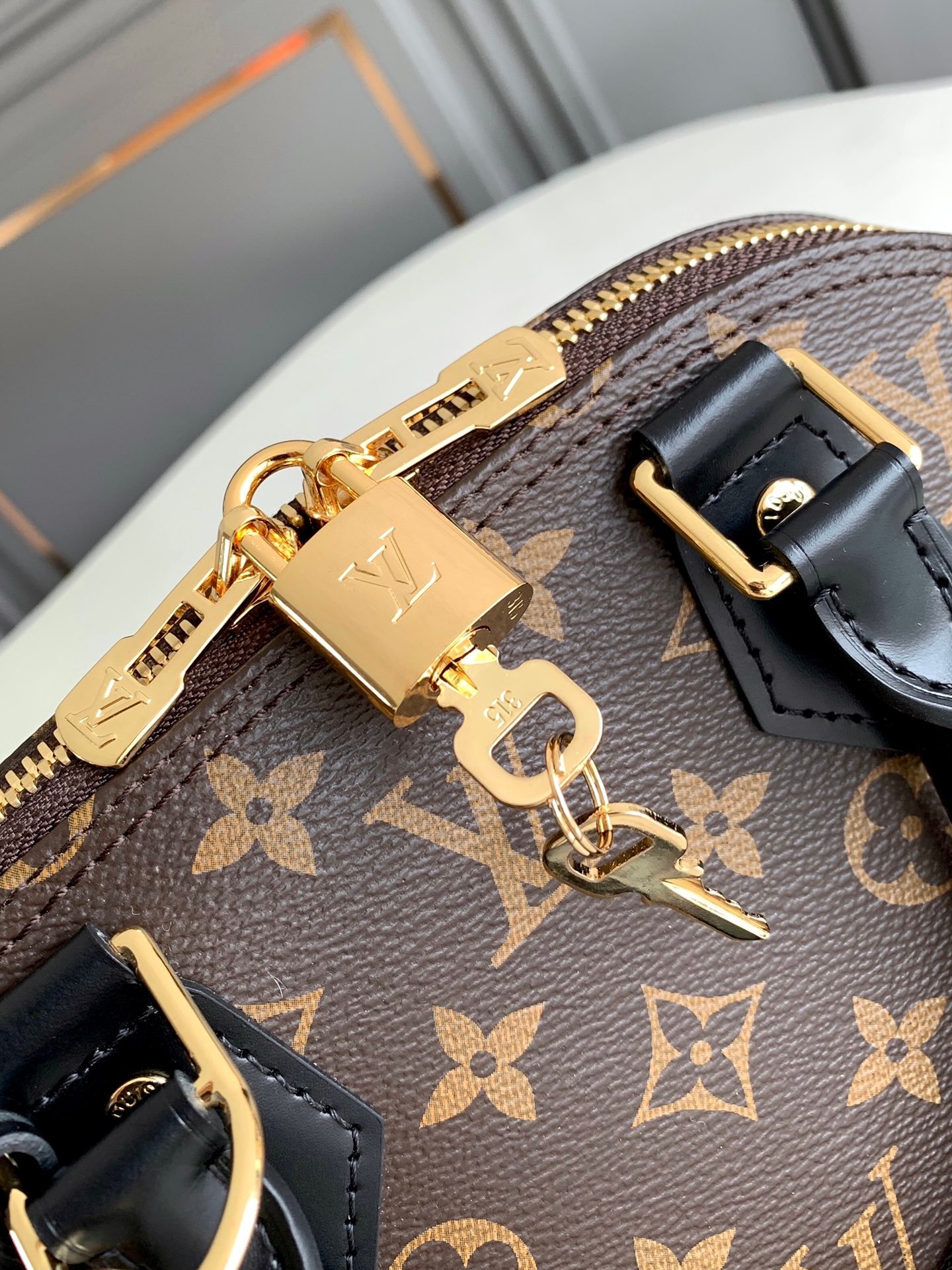 Louis Vuitton Alma BB Handbag Monogram Coated Canvas M53152